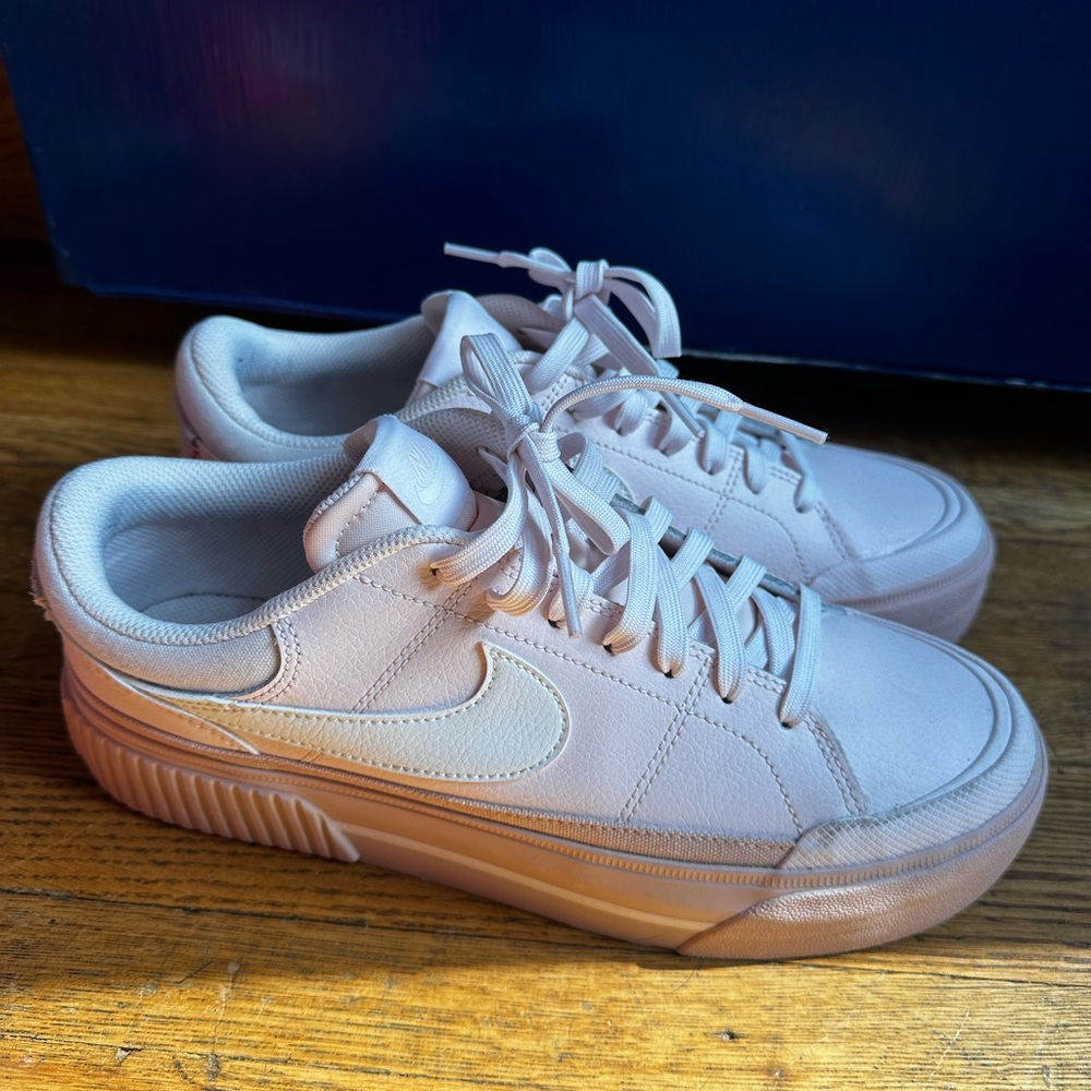 Women’s size 9.5 pink Nike court legacy lift shoes.